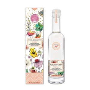 Bottle of bubble bath and box with illustrated flowers